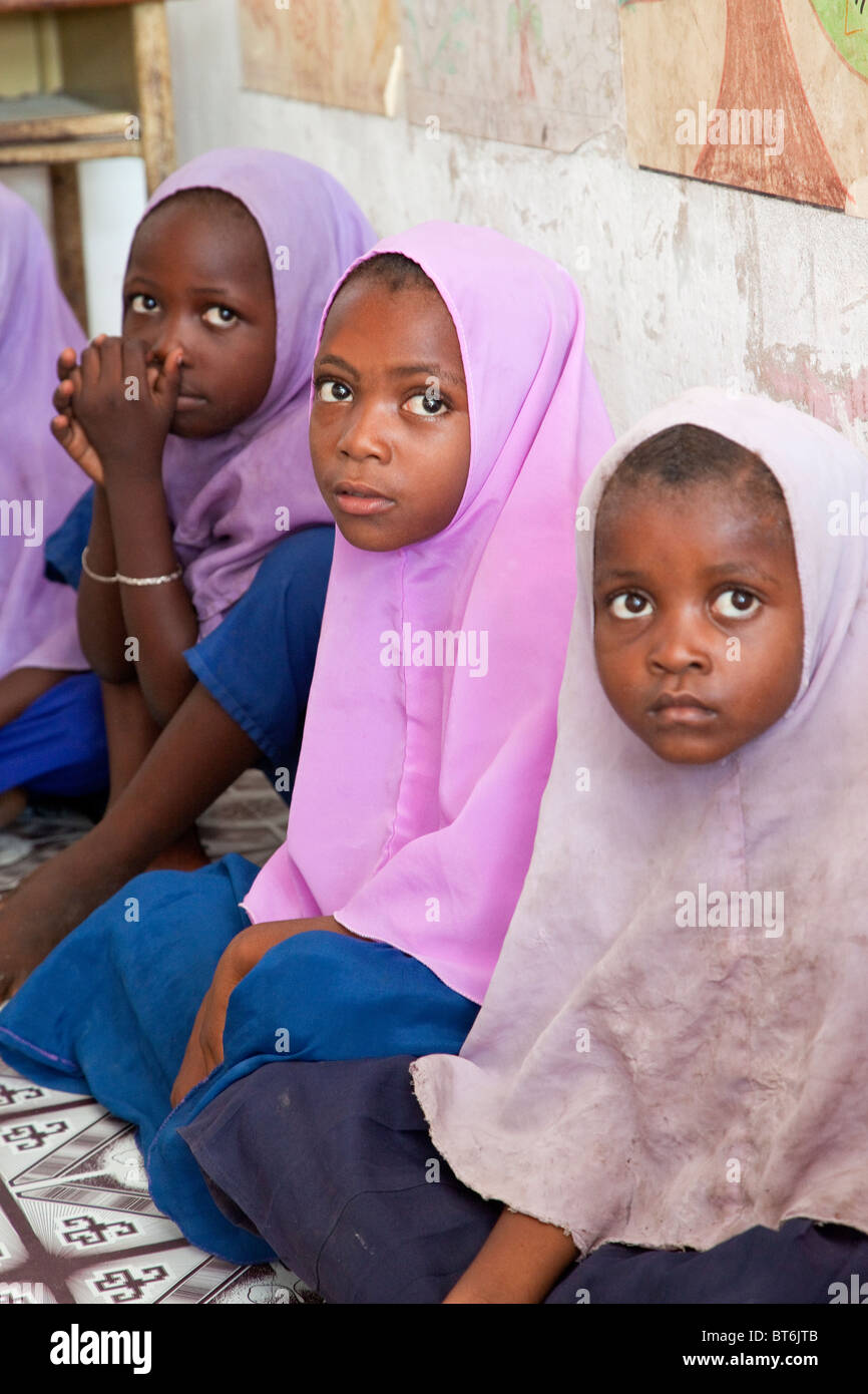Jambiani, Zanzibar, Tanzania. African Muslim Schoolgirls. Stock Photo