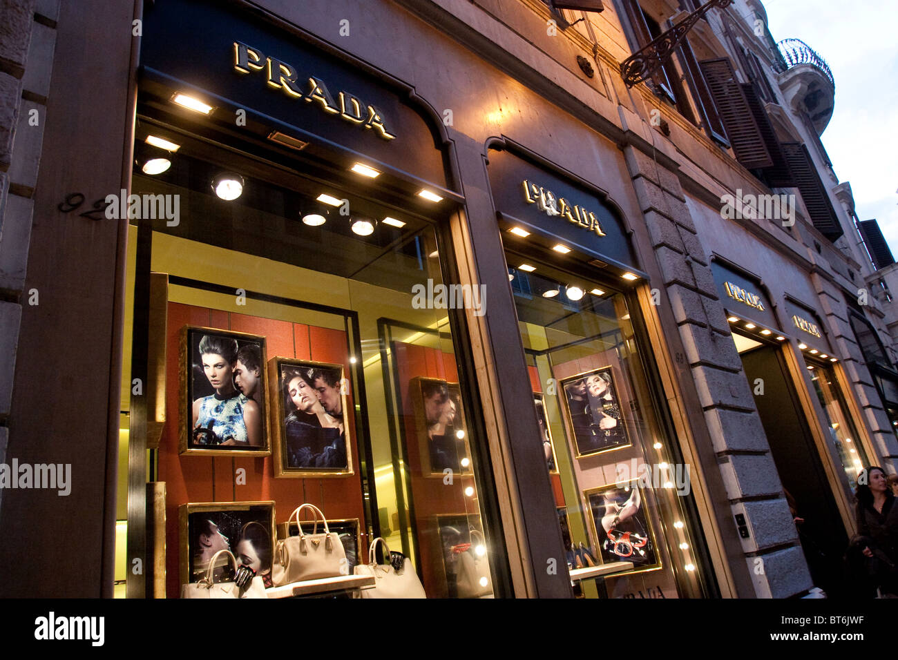 via dei Condotti Prada fashion shop shopping Rome street store shop window  entrance fashion accessories Stock Photo - Alamy