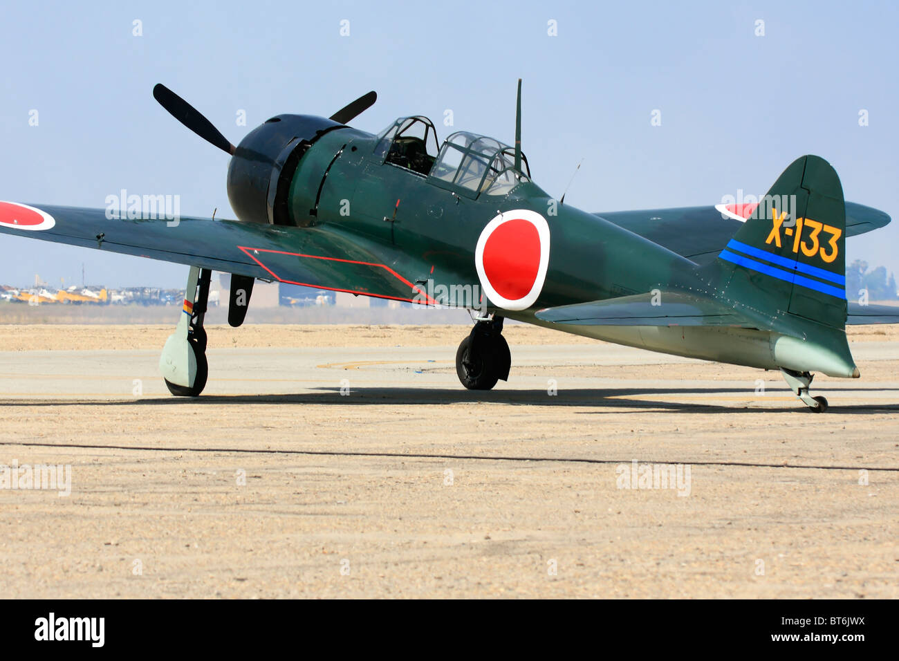 A Mitsubishi built A6M3 Zero fighter sits on the tarmac at Minter Field during the 2008 Warbirds in Action Airshow. Stock Photo