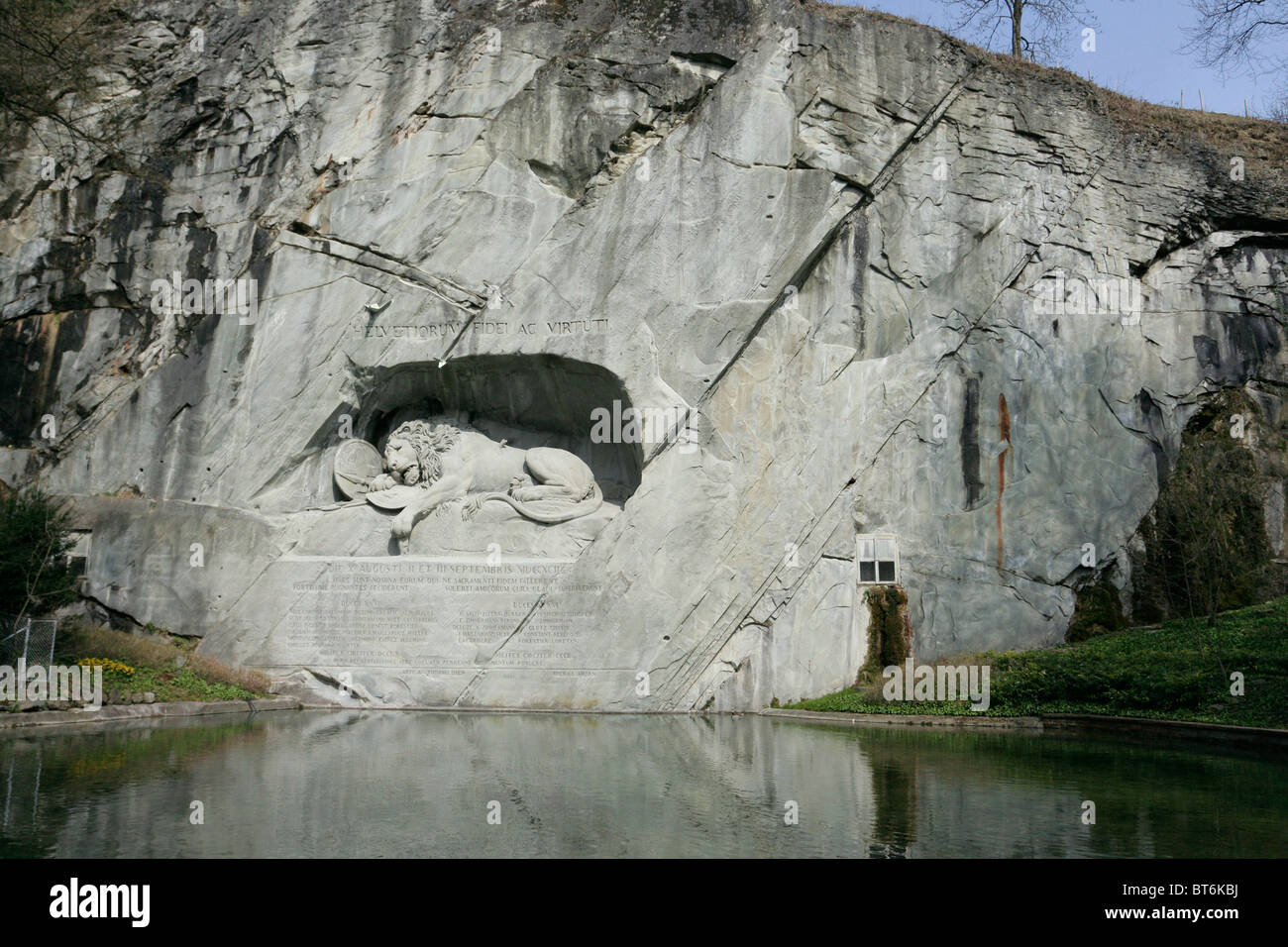 Carving of a dying lion on a hillside in Lucerne, Switzerland. Stock Photo
