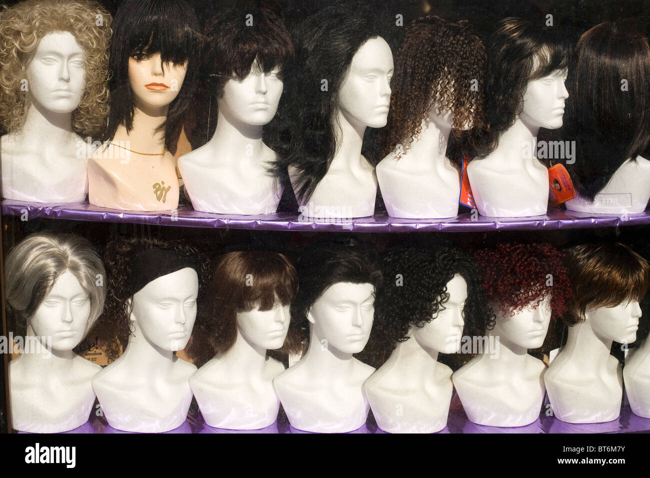 Shopping window with wigs Stock Photo