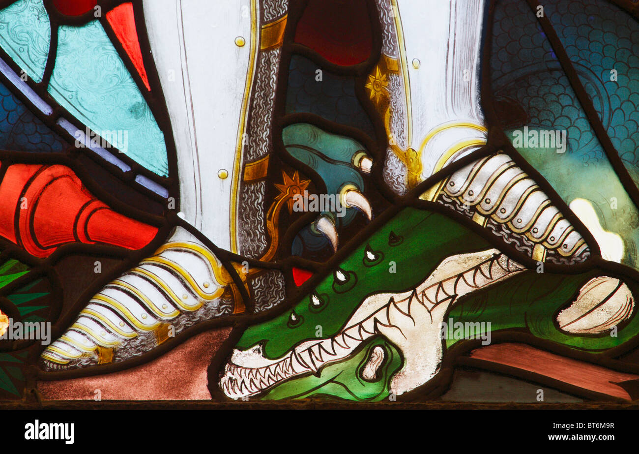 St George and dragon stained glass window Stock Photo