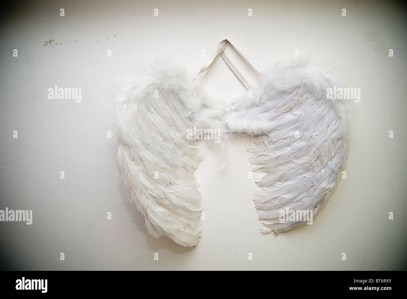 Angel wings on a wall Stock Photo