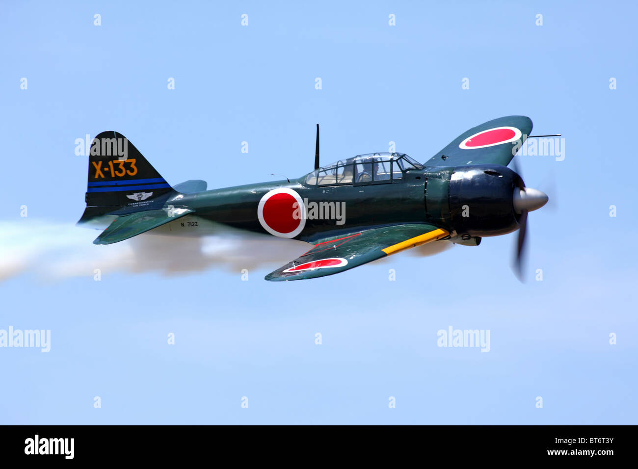 Mitsubishi built A6M3 Zero fighter in flight during an air show at Madera, California, in May of 2009. Stock Photo
