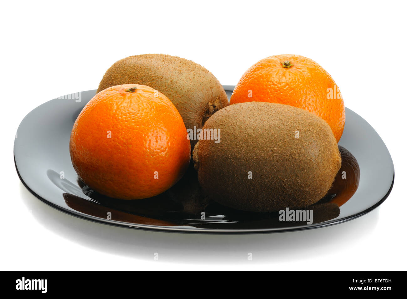 Kiwi on a plate Stock Photo