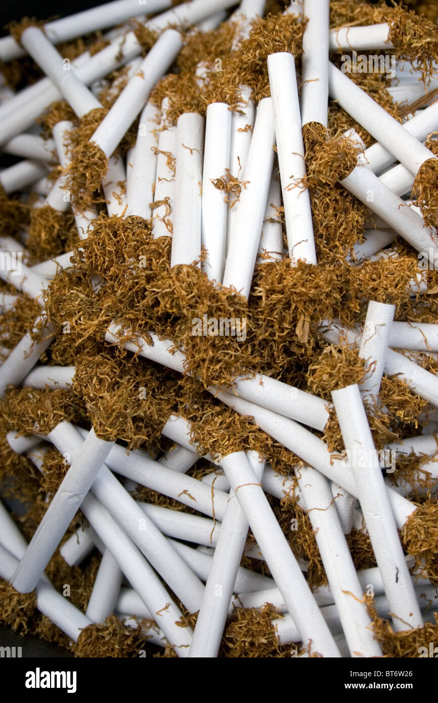 Hand rolled cigarettes hi-res stock photography and images