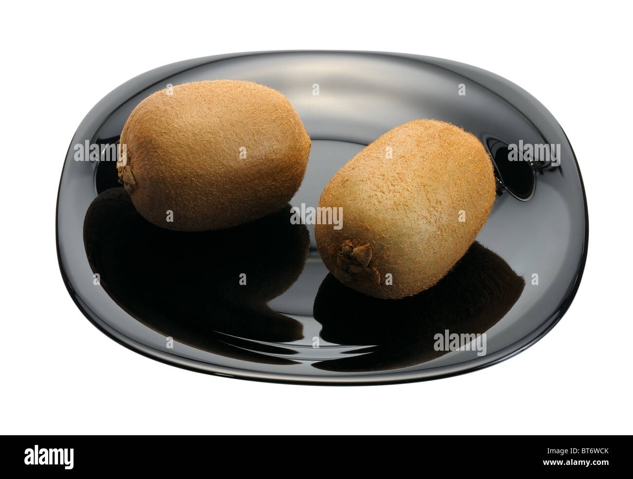 Kiwi on a plate Stock Photo