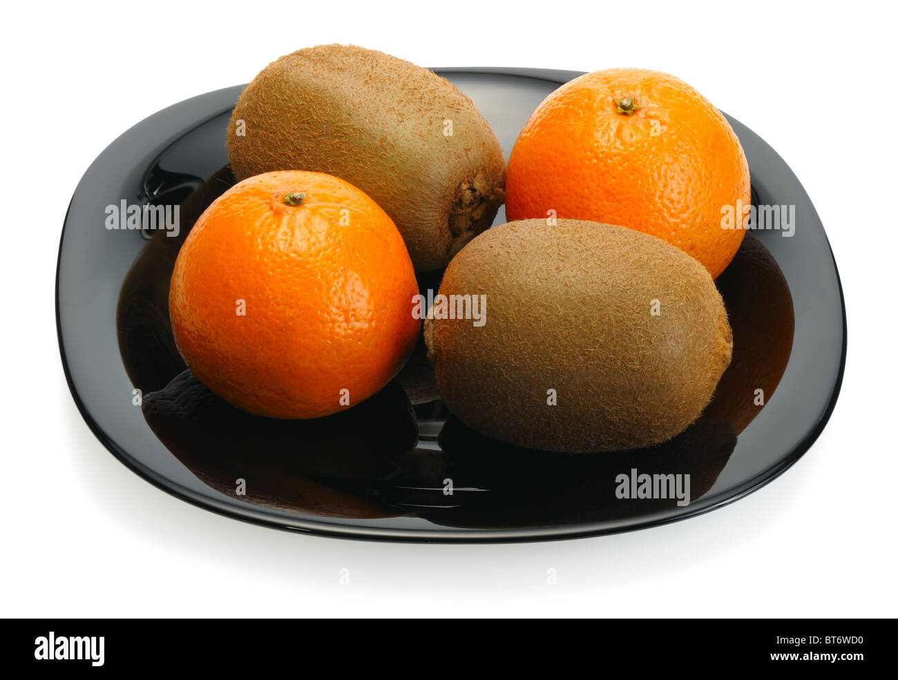 Kiwi on a plate Stock Photo