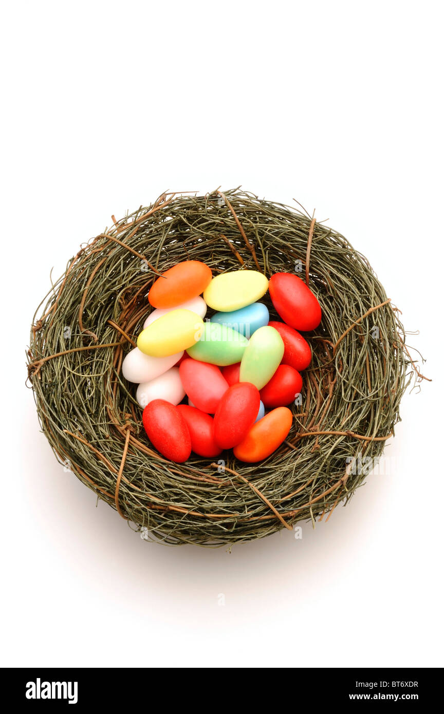 Coloured sugar easter eggs in an Easter basket Stock Photo