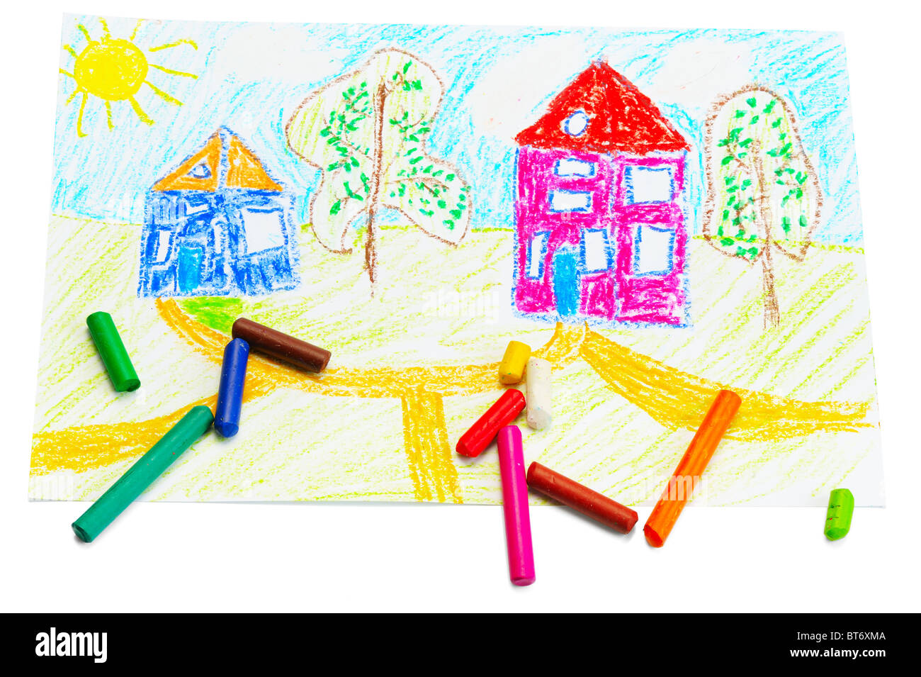 Wax crayons and a children's drawing. Stock Photo