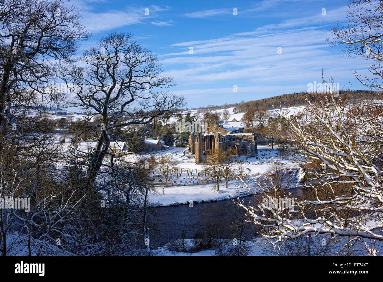 Bolton Priory next to the River Wharfe at Bolton Abbey, North Yorkshire. Winter Stock Photo