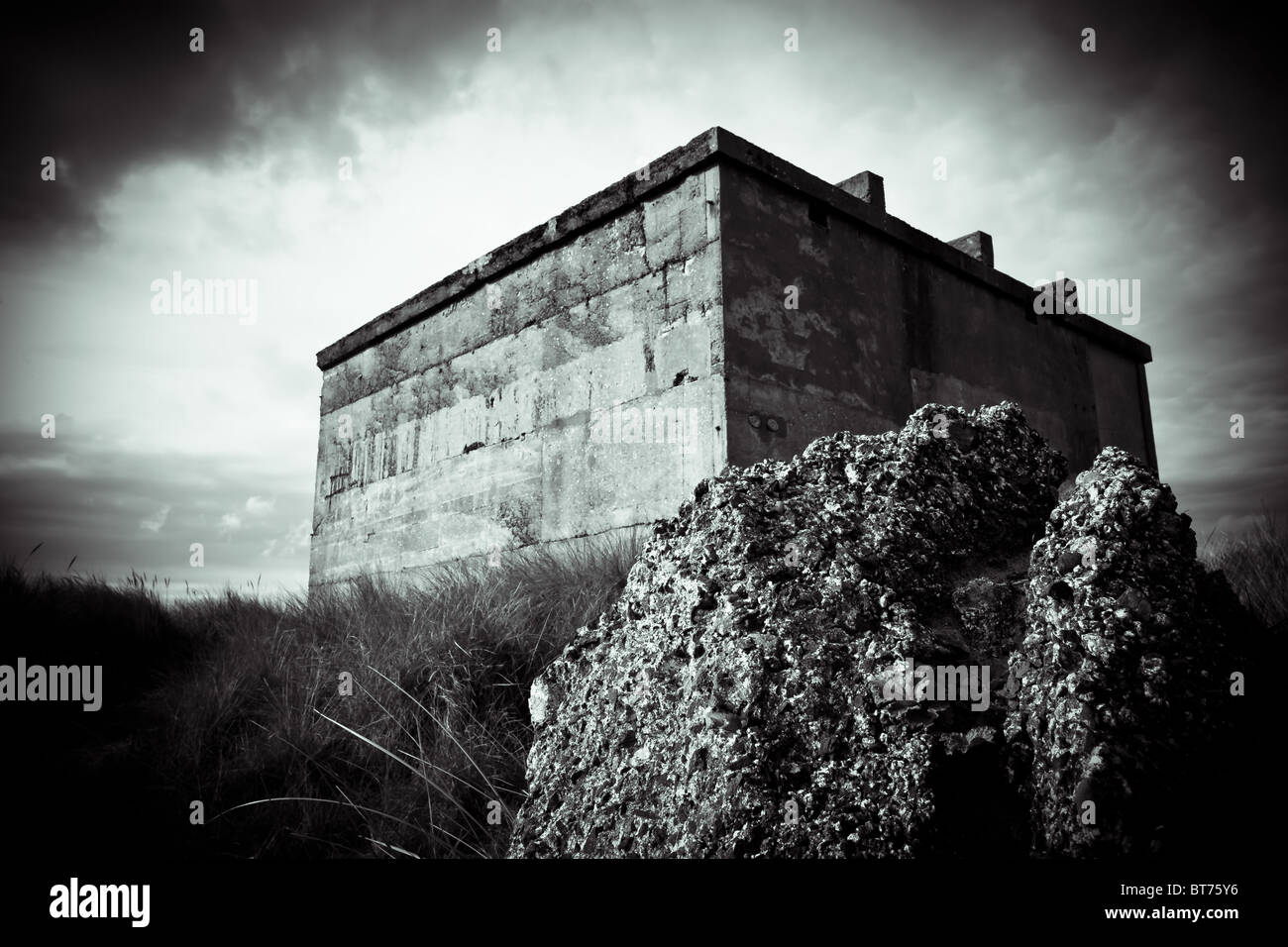 Old concrete World War Two bunker at Druridge Bay on the Northumberland Coast. Stock Photo