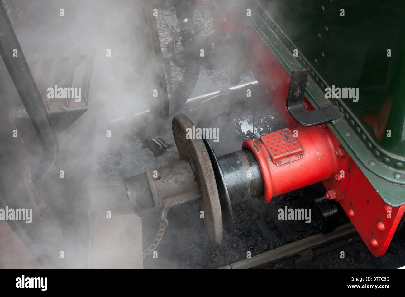 Buffers of railway engine and rolling stock in steam Stock Photo