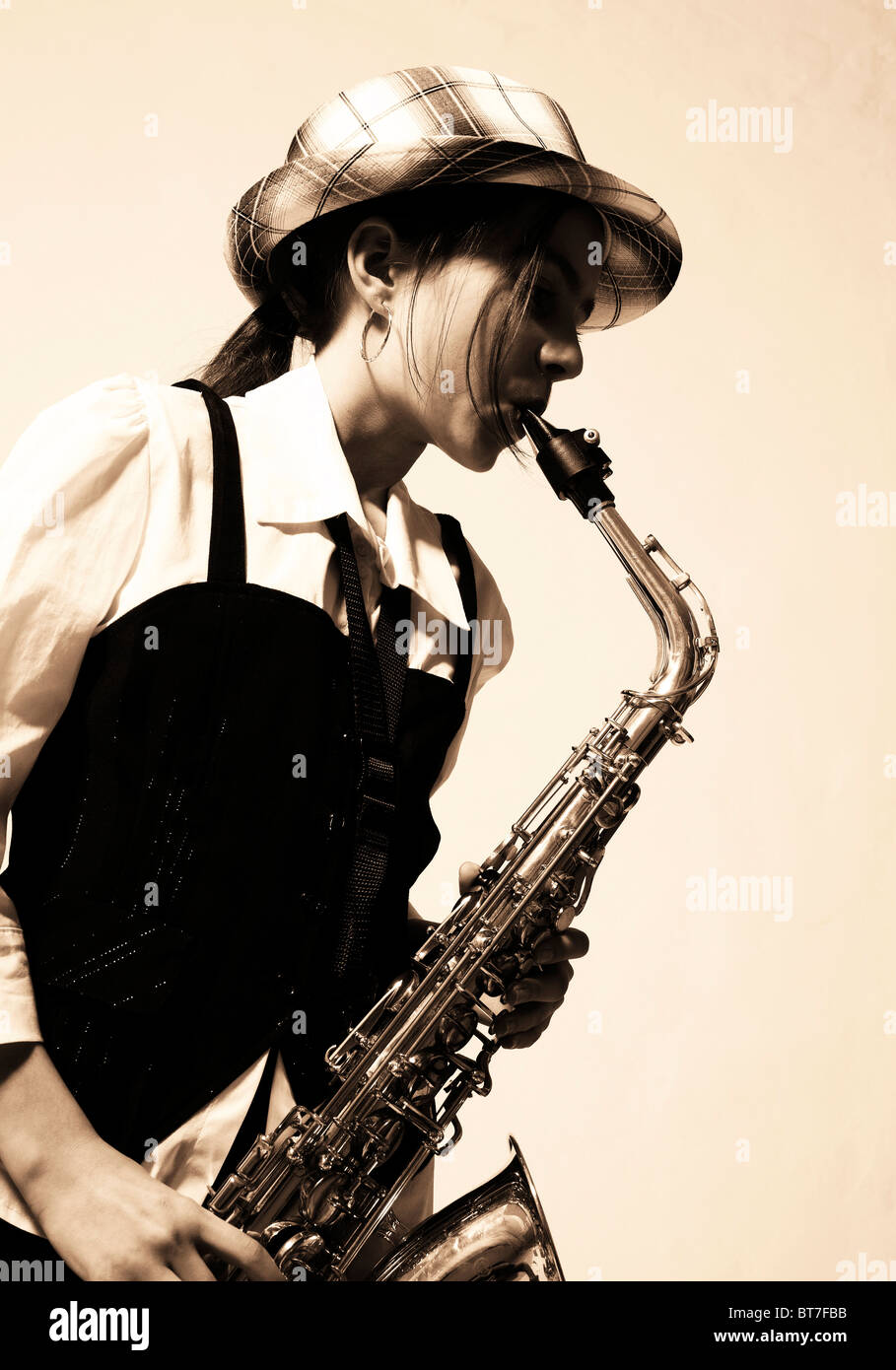 Girl playing the saxophone Stock Photo Alamy