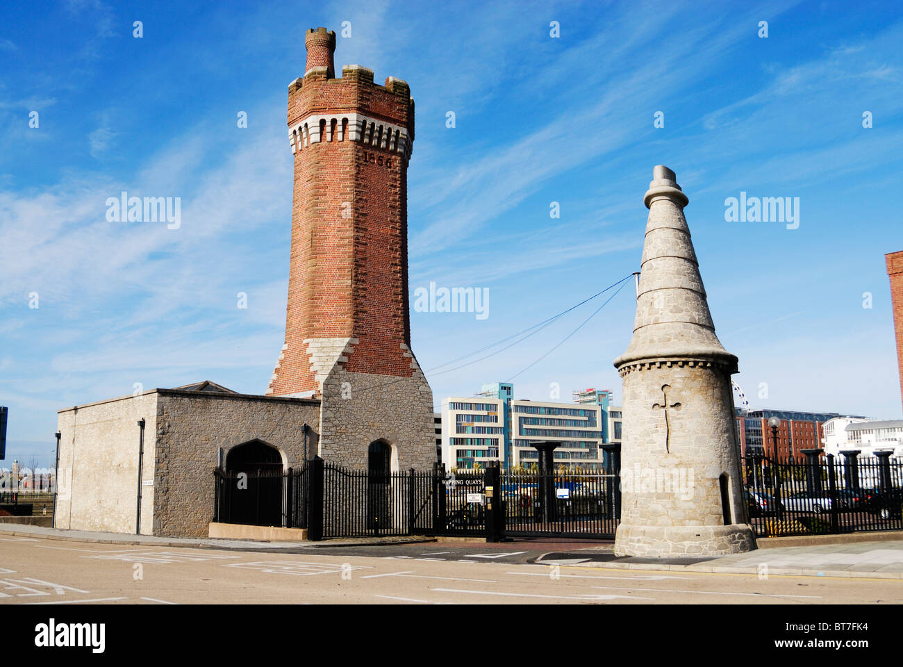 Pillars at the entrance to Wapping Dock / Queens Wharf and Kings Dock / Liverpool Arena in Liverpool Docks. Stock Photo