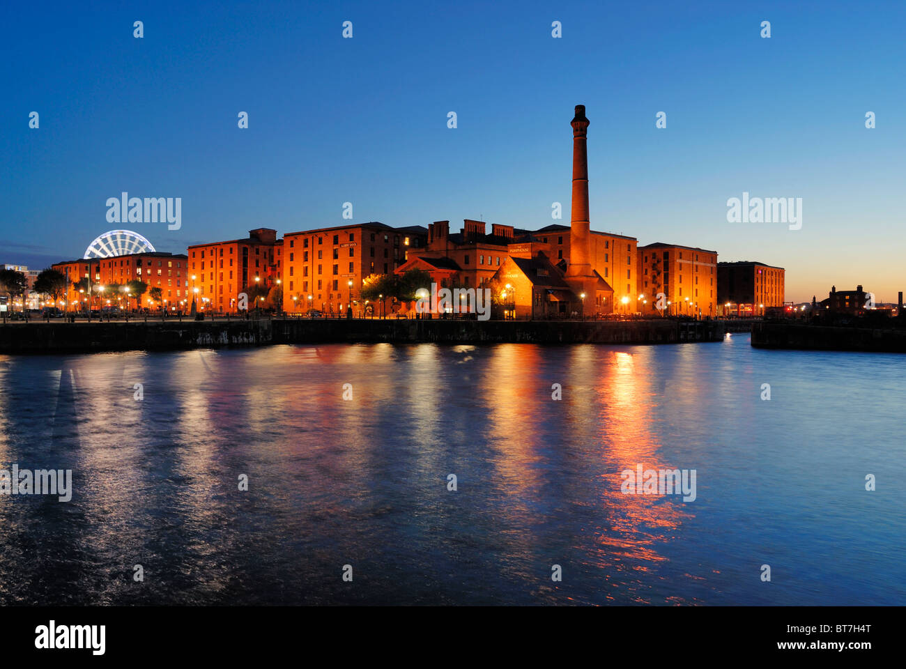 The buildings of the redeveloped Albert Dock complex in Liverpool as seen across Canning Dock. Stock Photo