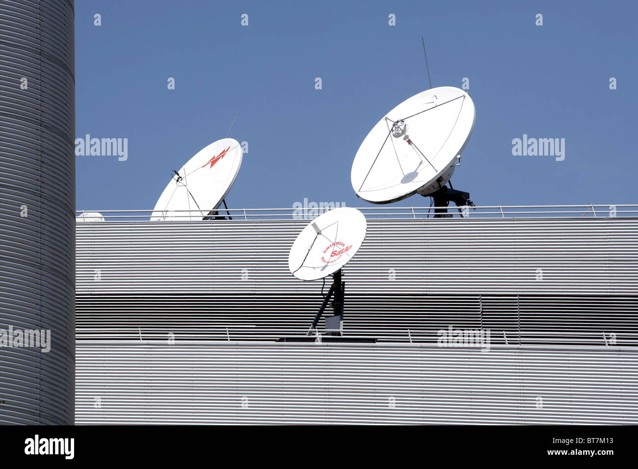 Satellite dishes on the roof of the headquarters and broadcasting centre of the RTL Group, Radio Television Luxembourg Stock Photo