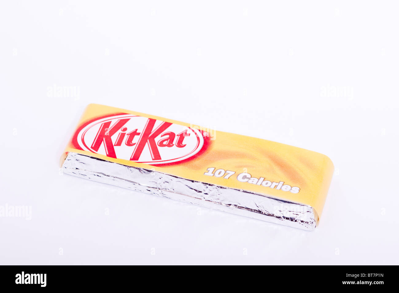 A close up photo of a caramel KitKat chocolate bar against a white background Stock Photo