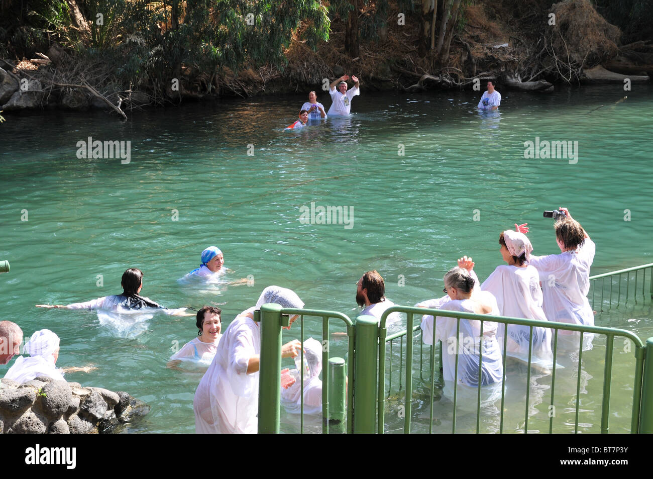 Israel, Yardenit Baptismal Site In the Jordan River Near the Sea of Galilee, A group of pilgrims