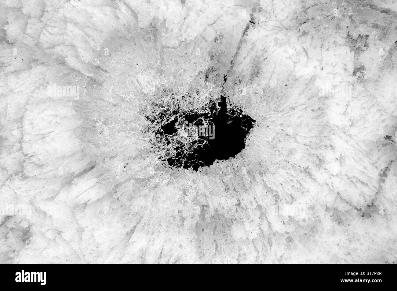 Surface of a spring with hole Stock Photo - Alamy