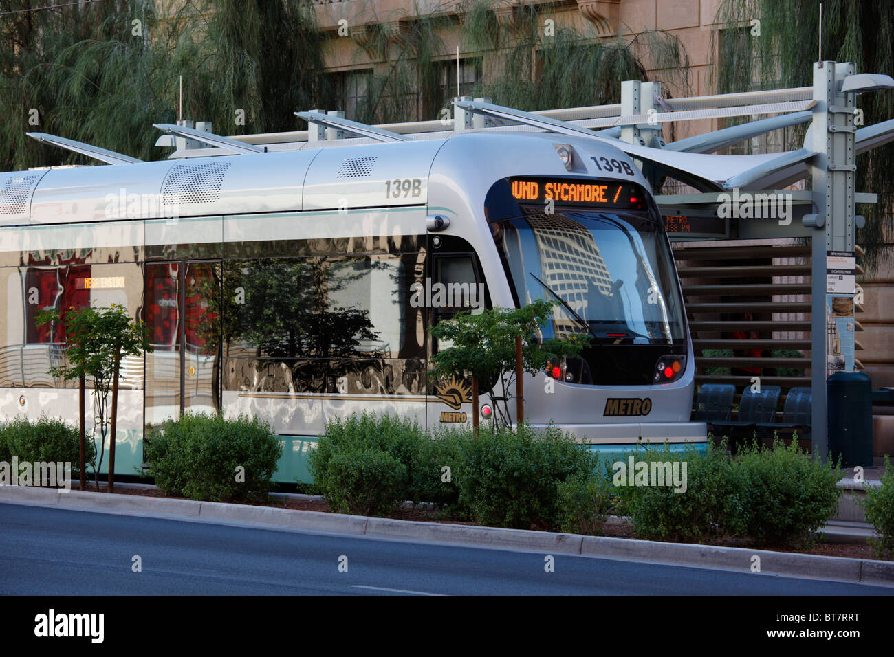 Light rail train at a stop in downtown Phoenix, Arizona, USA. Stock Photo