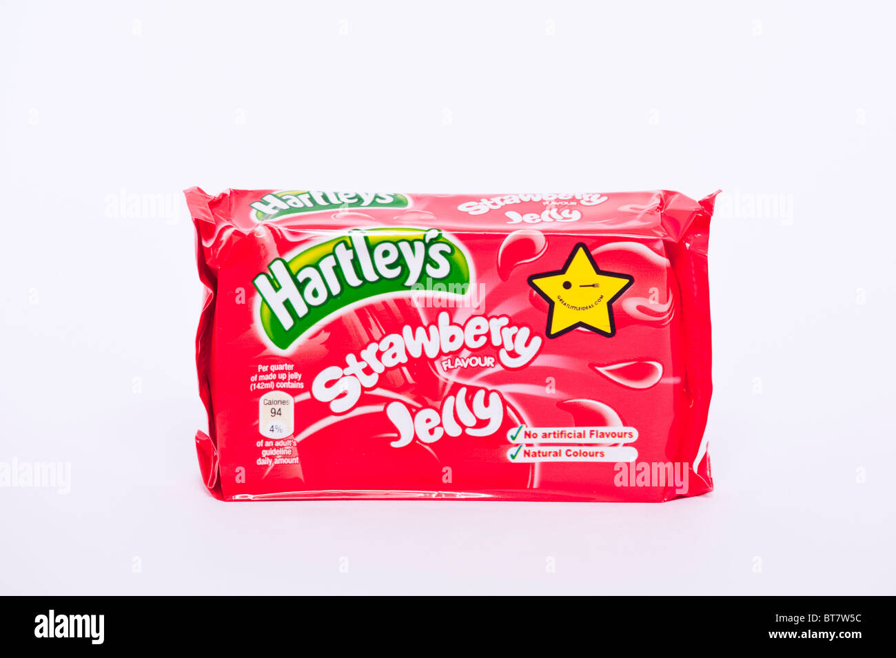A close up photo of a packet of Hartleys strawberry flavour jelly against a white background Stock Photo
