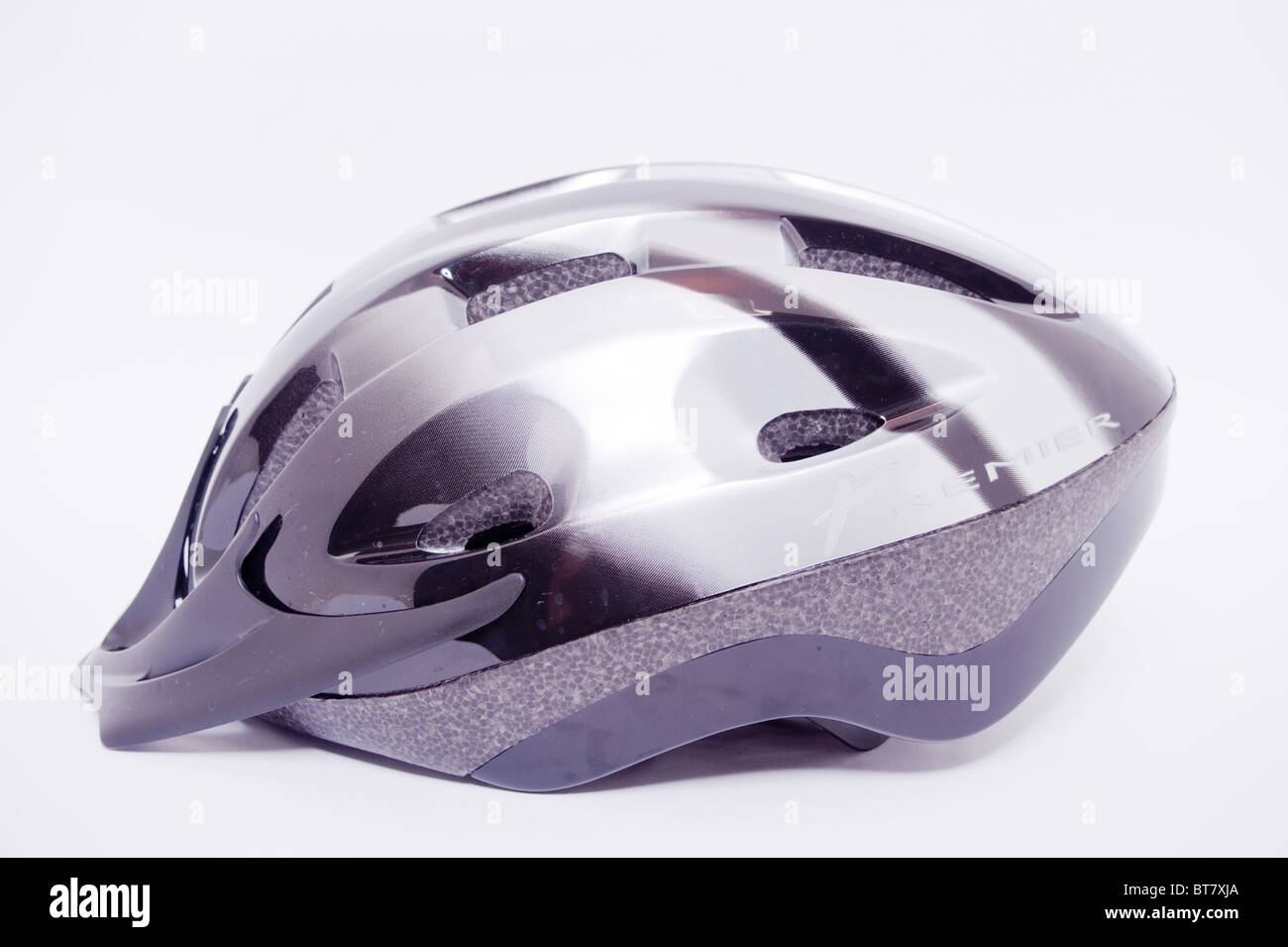 A close up photo of a cycle safety helmet against a white background Stock Photo