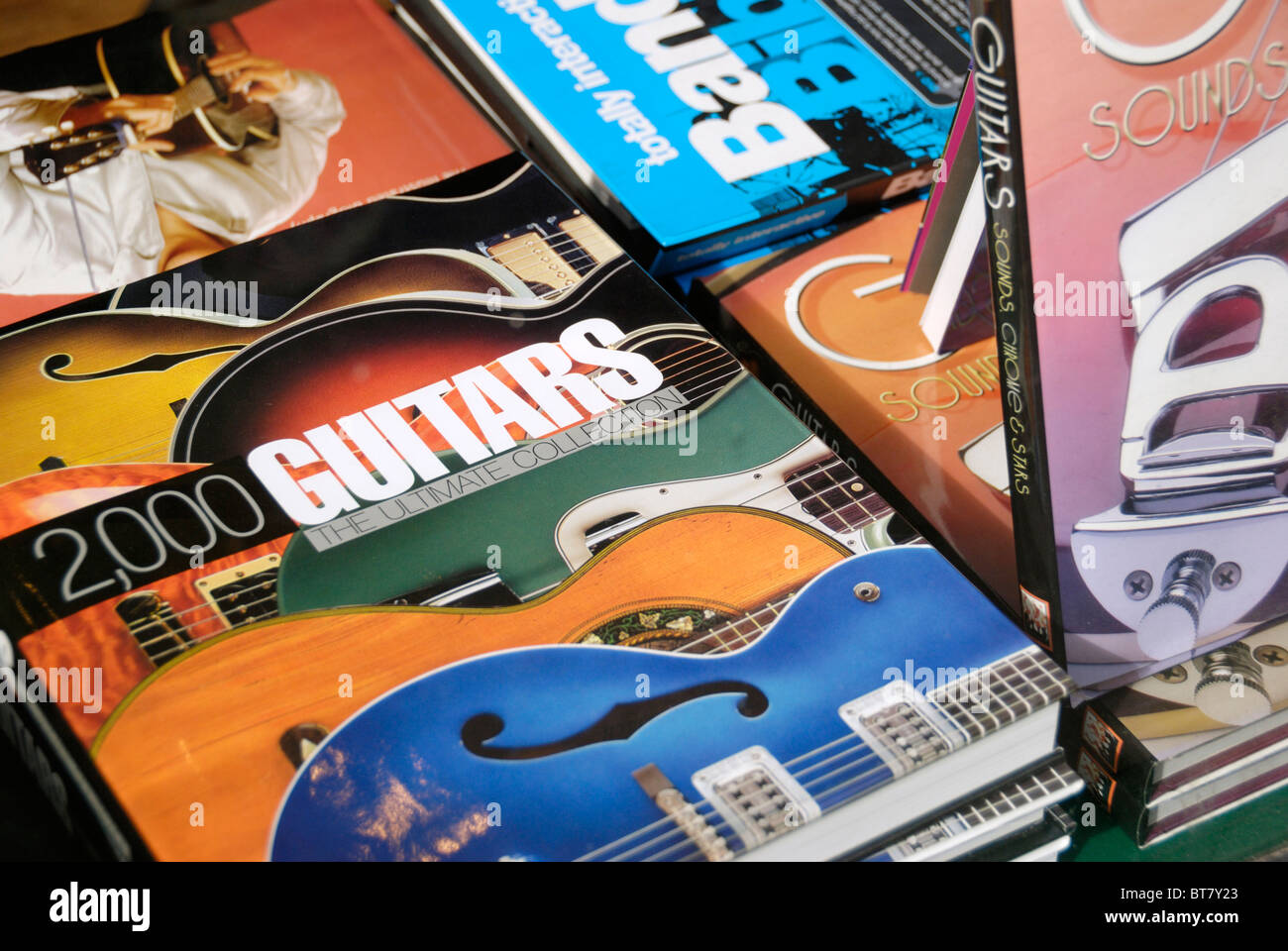 Display of books about guitars in a shop window Stock Photo