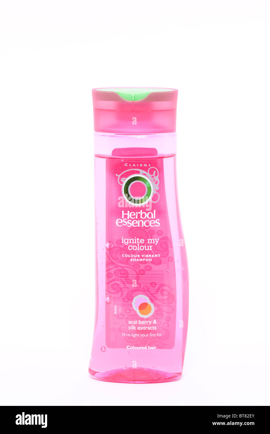 A close up photo of a bottle of Herbal essences hair shampoo against a white background Stock Photo