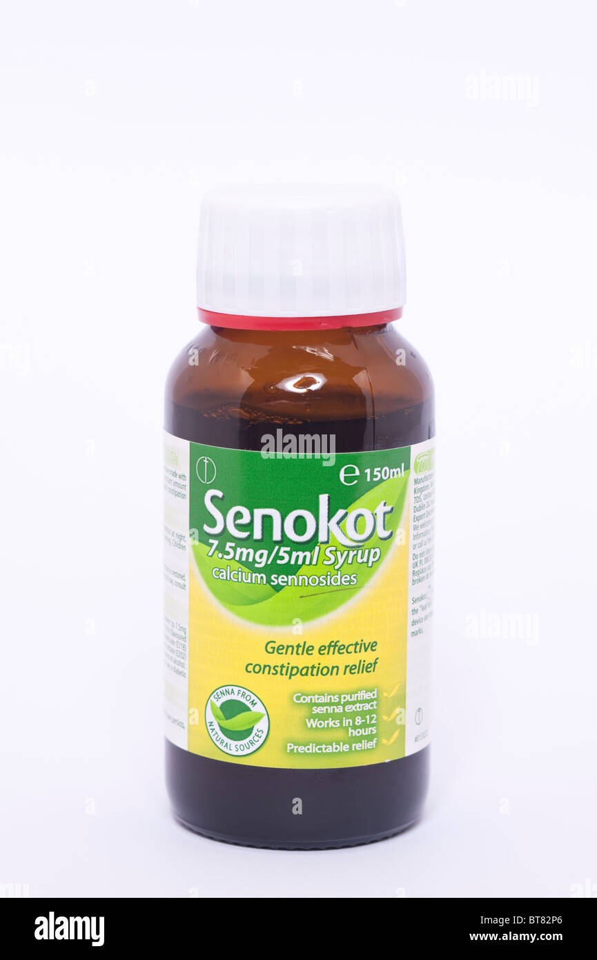 A close up photo of a bottle of Senokot medicine for constipation relief against a white background Stock Photo