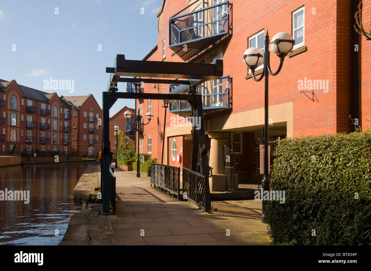 Canal side housing at the Piccadilly Village development, near the city centre of Manchester, England, UK Stock Photo