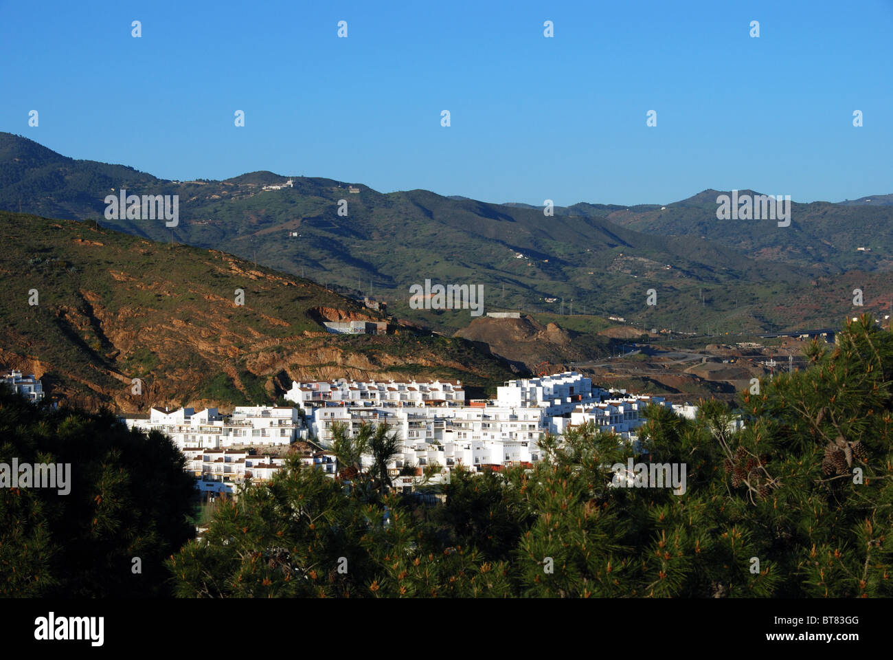 Apartments on the edge of the Montanas de Malaga, Malaga, Costa del Sol, Malaga Province, Andalucia, Spain, Western Europe. Stock Photo