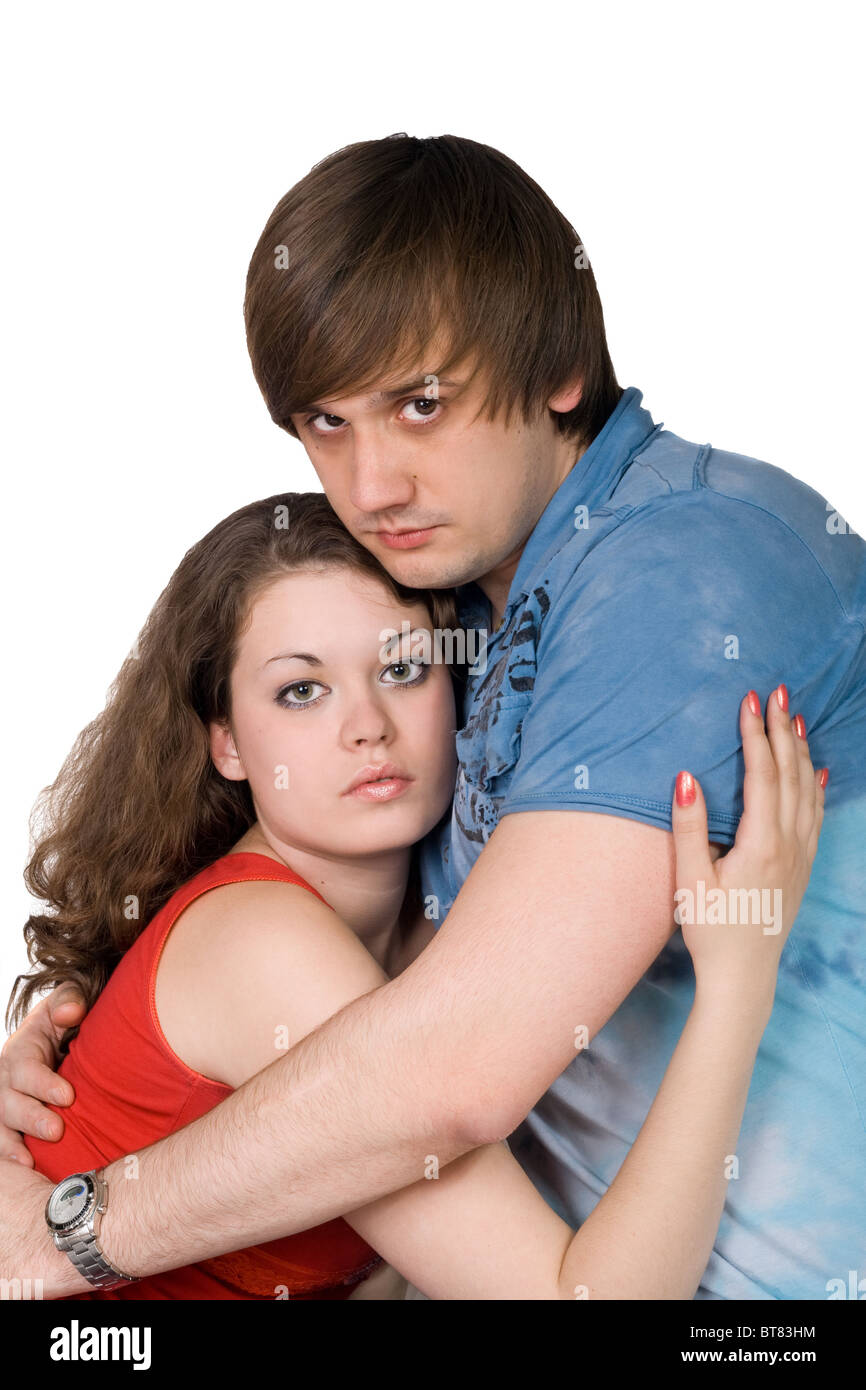 The young couple. Isolated on a white background Stock Photo - Alamy