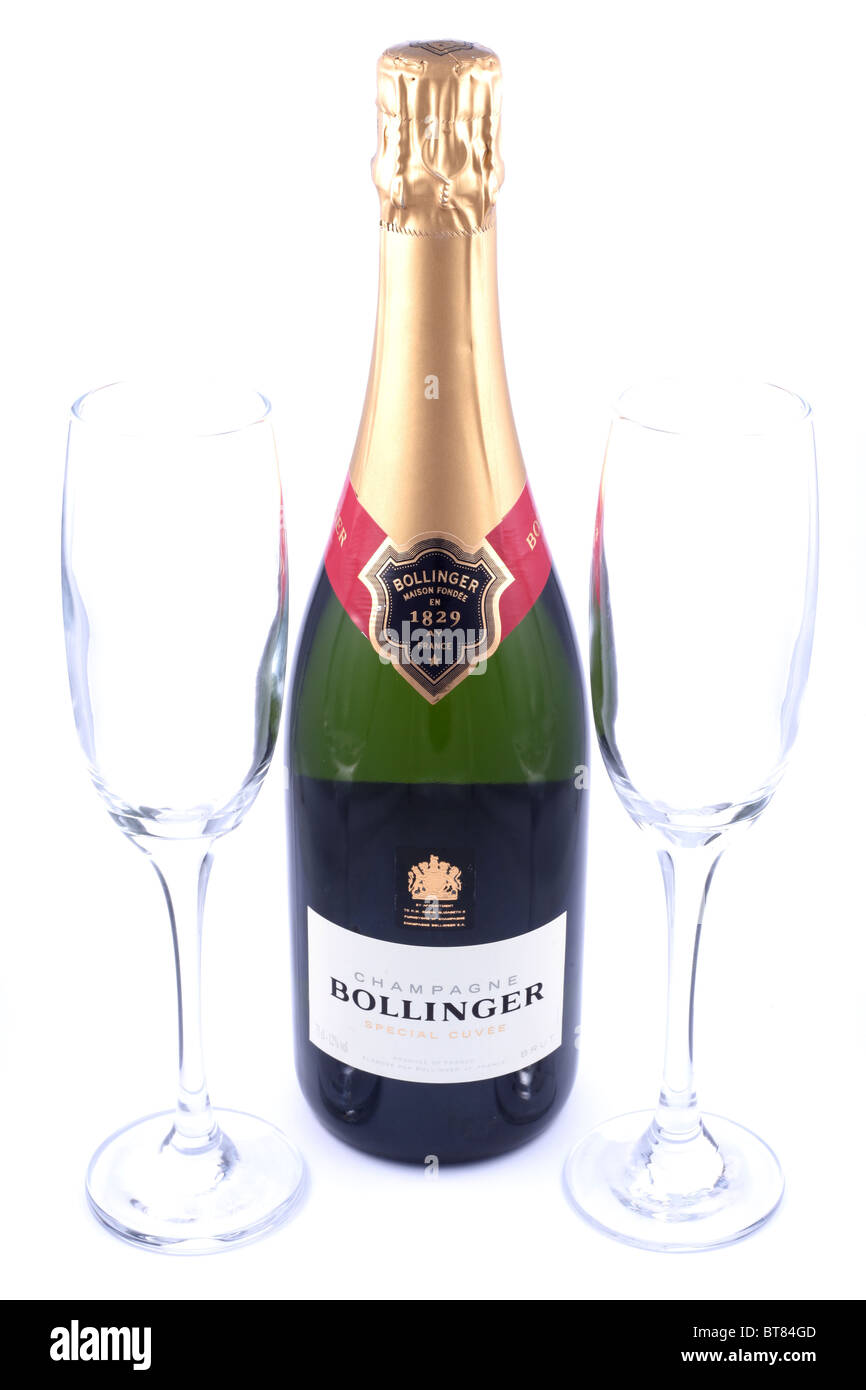 Bottle of Bollinger Special Cuvee Champagne with two champagne flutes. Stock Photo