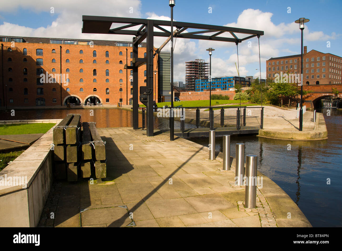 Old warehouses converted to modern apartments at Piccadilly Basin on the Rochdale Canal, near Manchester city centre, England UK Stock Photo