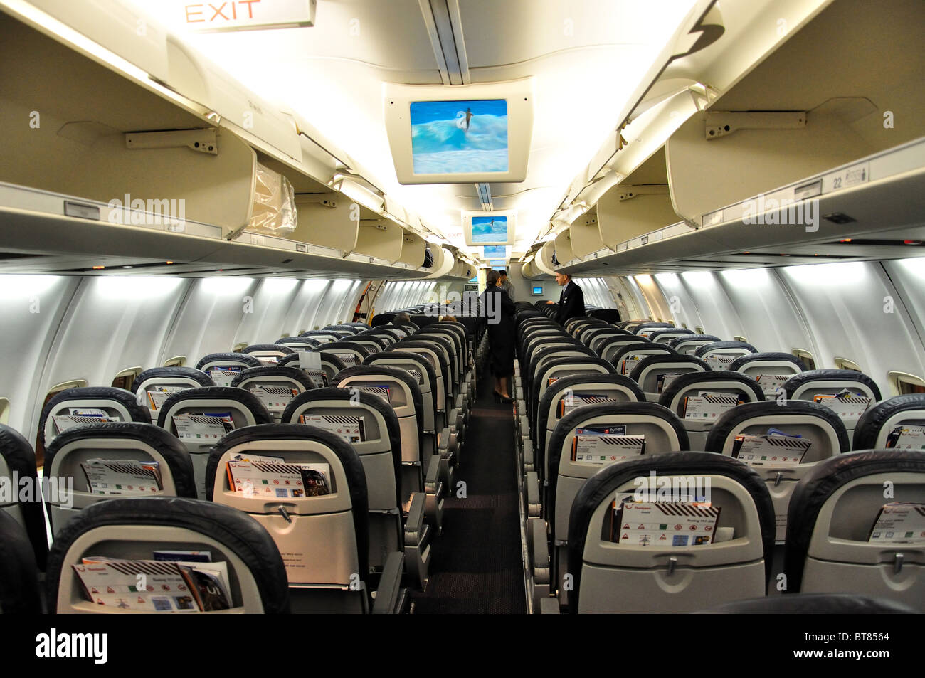 Thomson Boeing 757-200 aircraft interior, North Terminal, Gatwick Airport, Crawley, West Sussex, England, United Kingdom Stock Photo