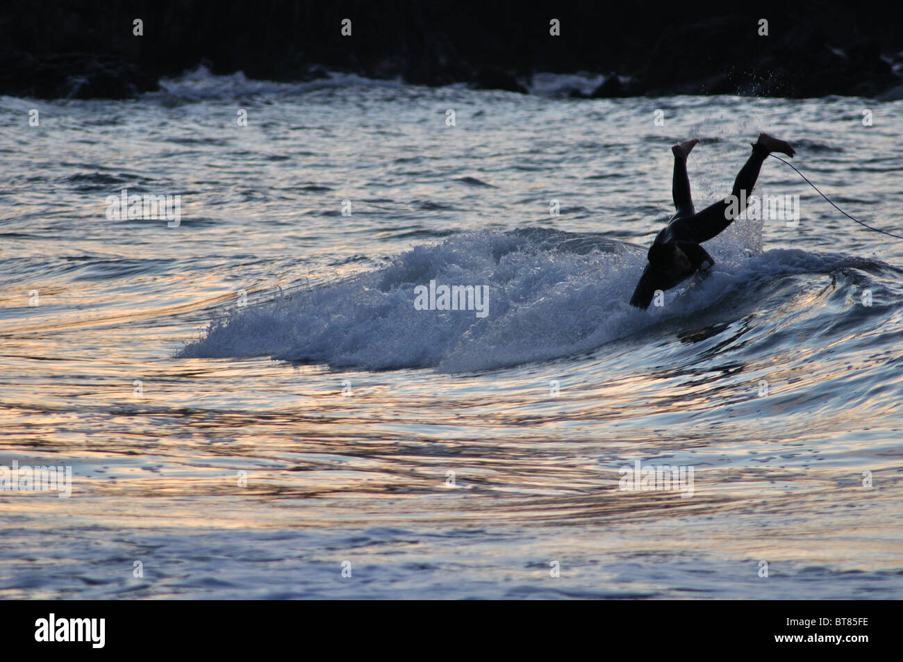 Surfing at Tresaith beach, Aberporth, Ceredigion, Wales, United Kingdom Stock Photo