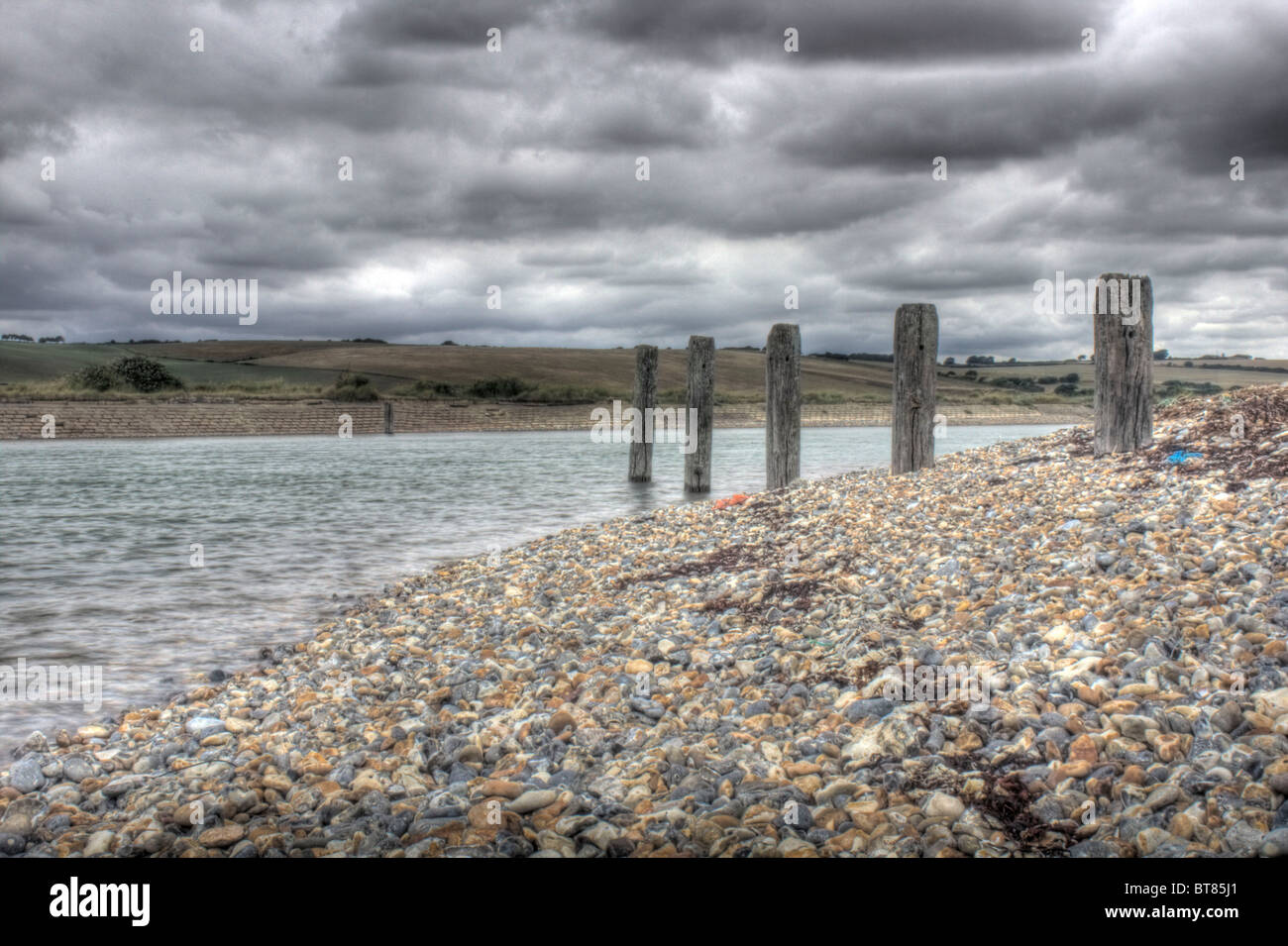 Groynes at Cuckmere Haven, East Sussex, United Kingdom coast Stock Photo