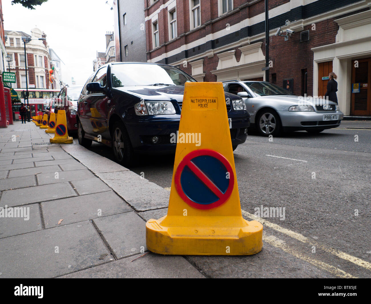 Cars parked in London on suspended parking bays Stock Photo Alamy