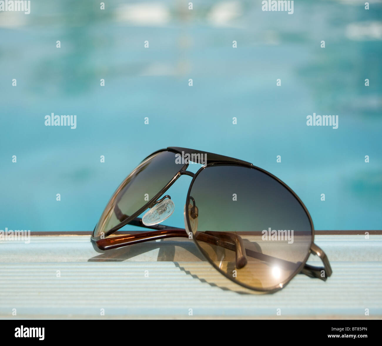 Sunglasses by the Pool Stock Photo Alamy