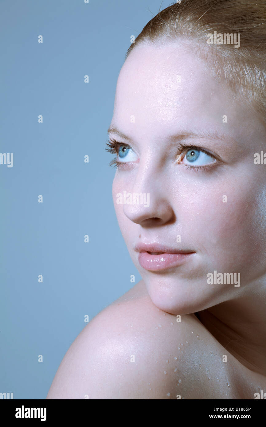 Young woman, waterdrops on her skin Stock Photo