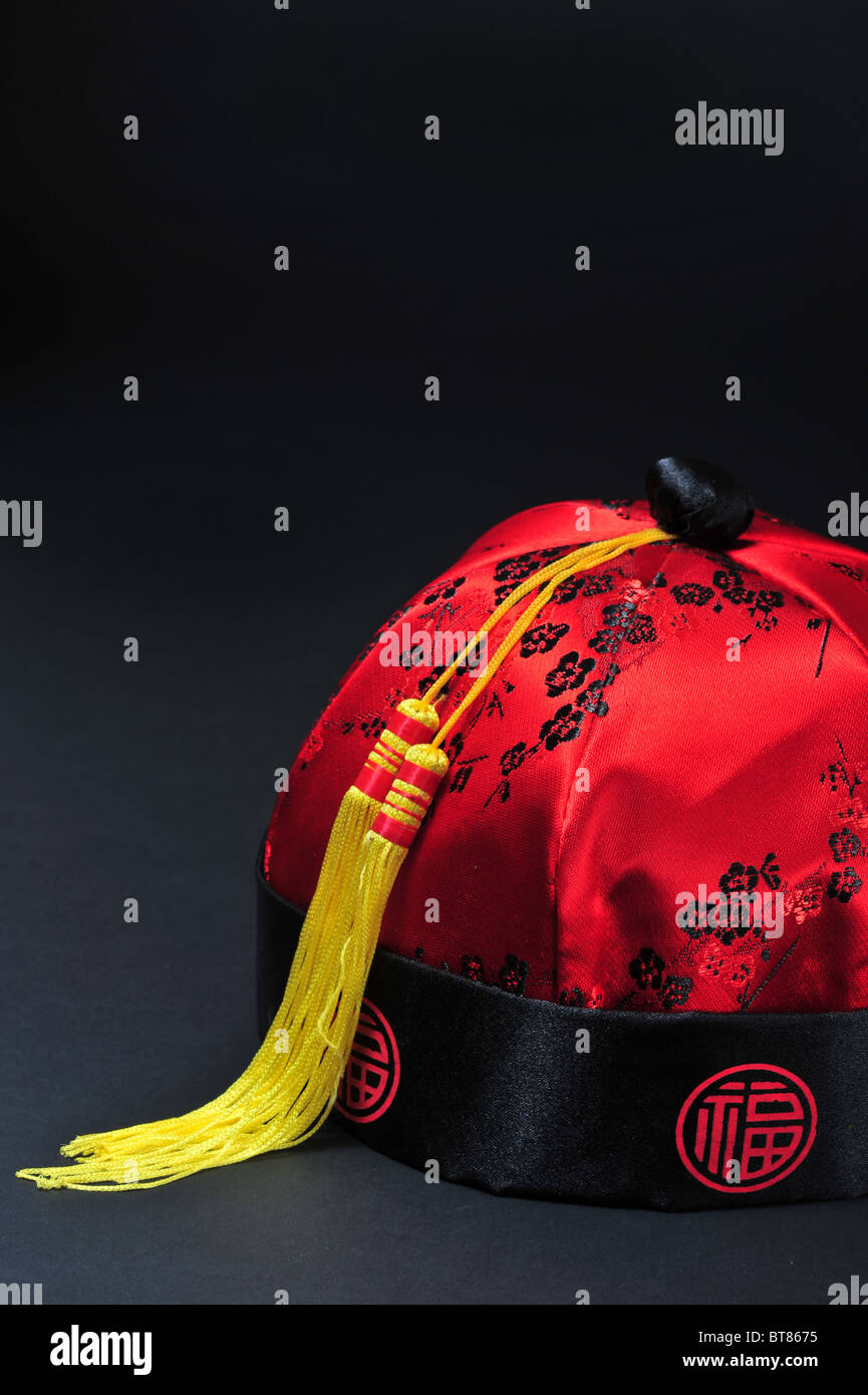 Red Chinese Silk Hat. Stock Photo