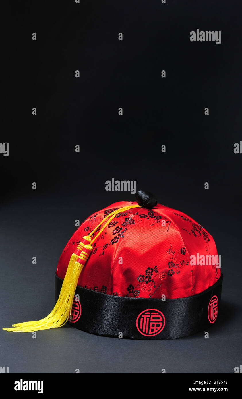 Red Chinese Silk Hat. Stock Photo
