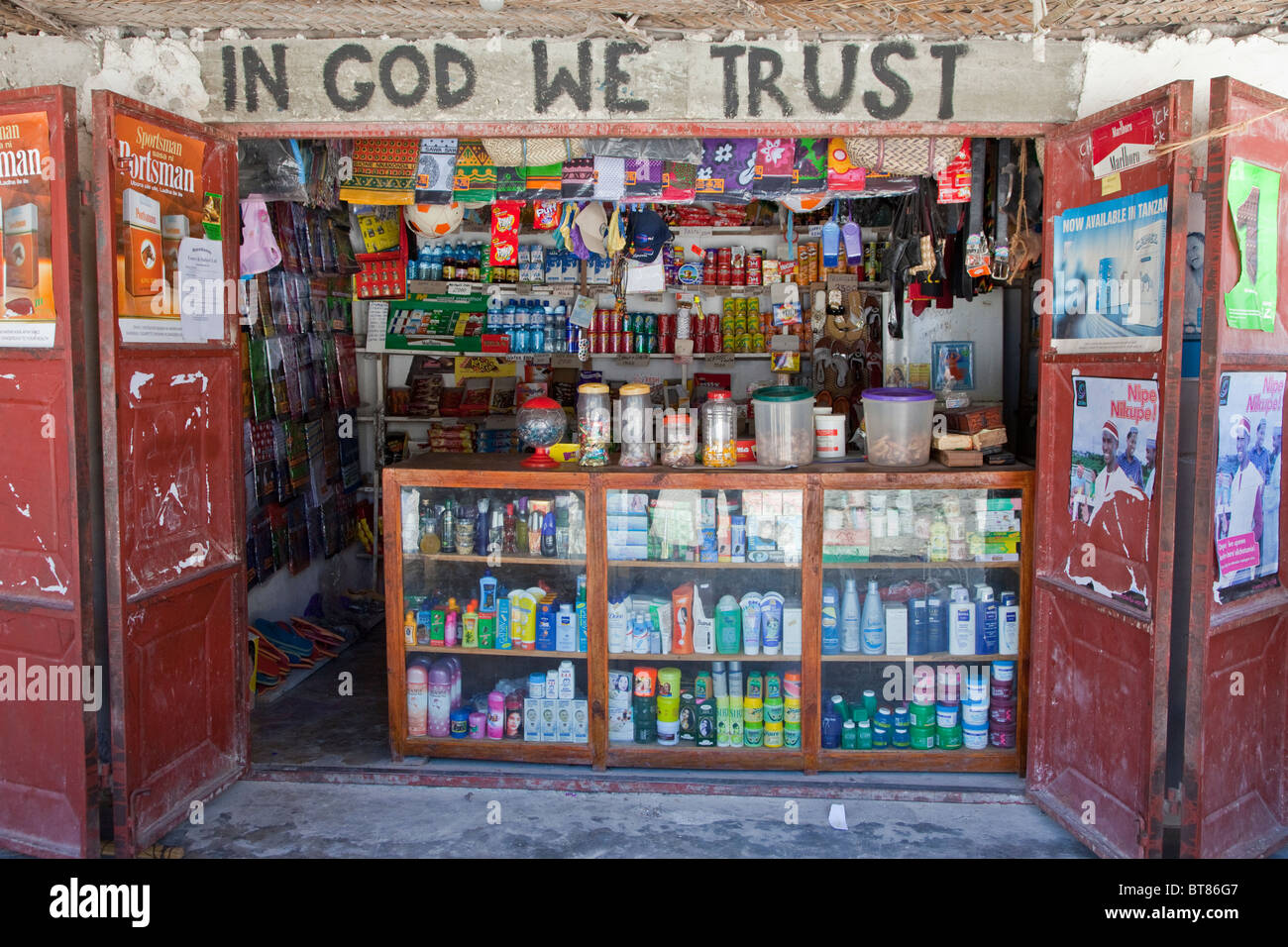 Jambiani, Zanzibar, Tanzania. Village Shop Selling Foodstuffs, Soft Drinks, Hair Care Products, Candy, and Sundries. Stock Photo