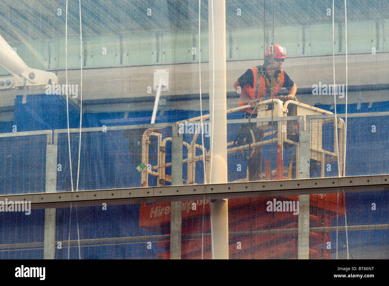 Workman at Eden Park Stadium, Auckland, New Zealand Stock Photo