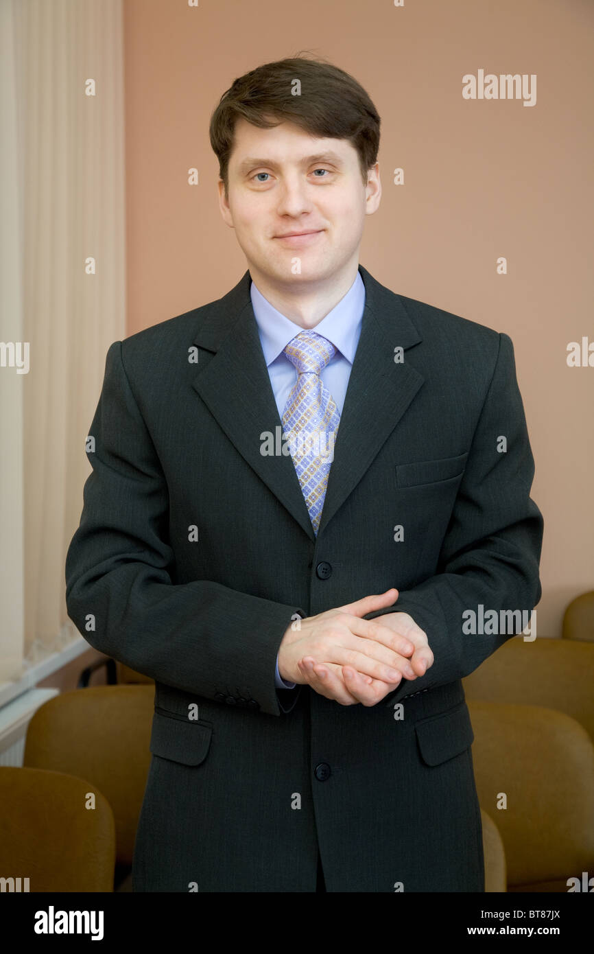 Business man in blue suit hi-res stock photography and images - Alamy
