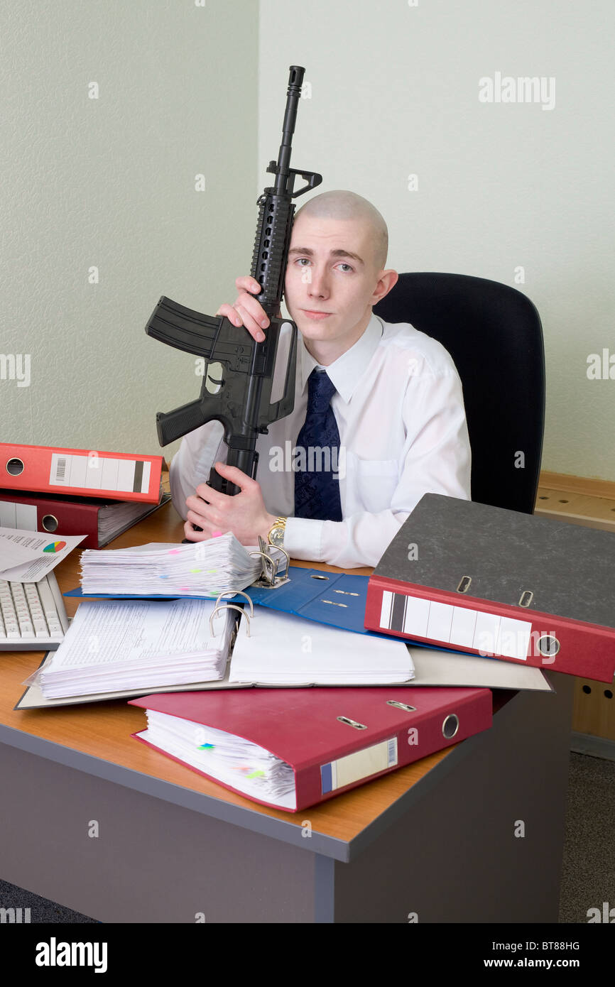 The chief accountant armed with a rifle Stock Photo Alamy