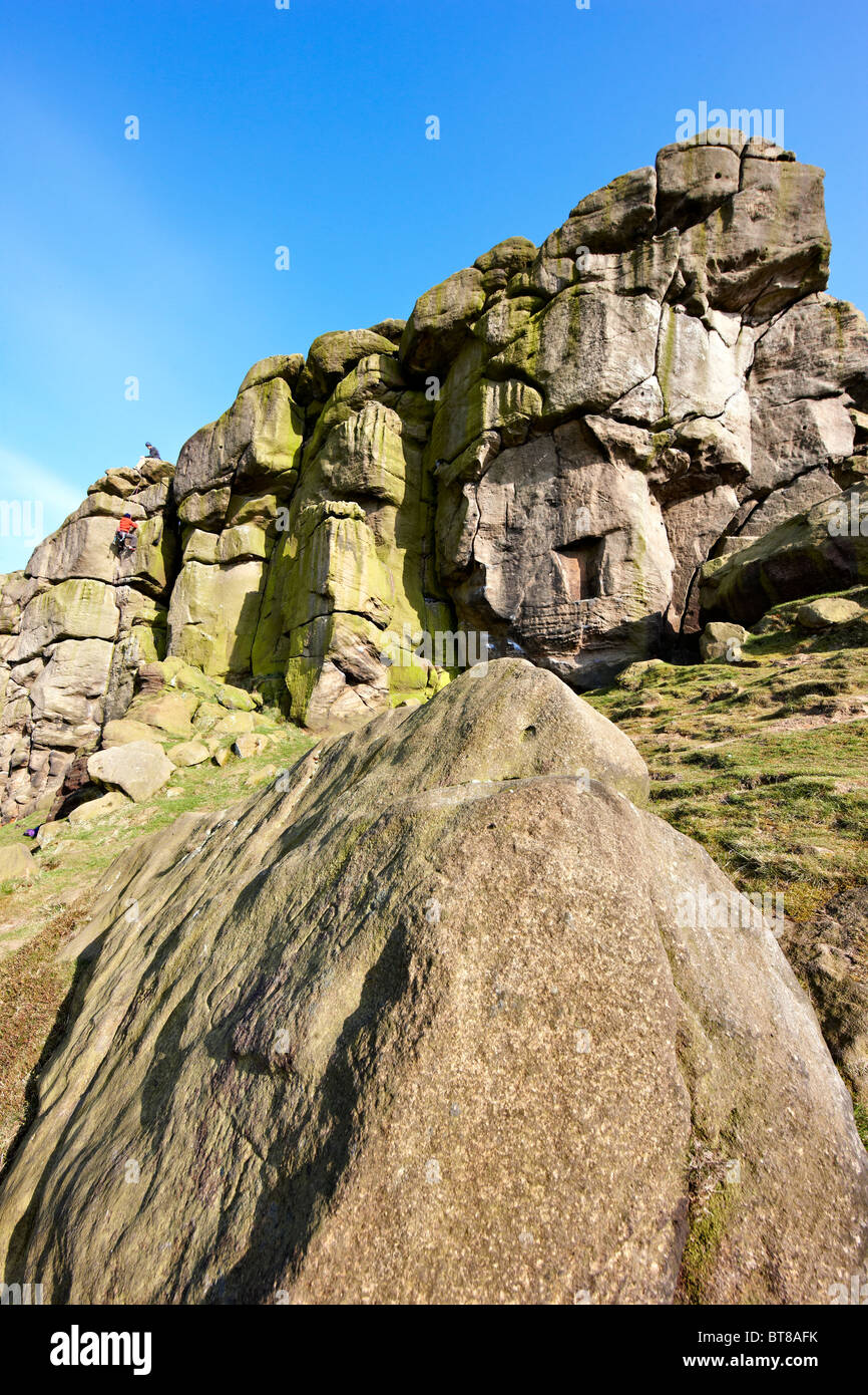 Rock climbing at Almscliffe Crag, near Harrogate, North Yorkshire. Spring Stock Photo