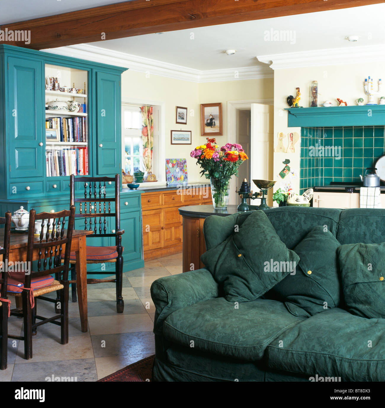 Green Sofa In Traditional Country Kitchen Dining Room With