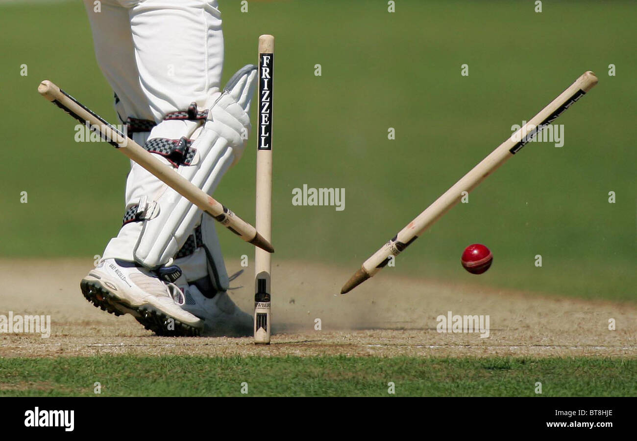 A batsman is clean bowled during an English County Championship Cricket match.  Picture by James Boardman. Stock Photo